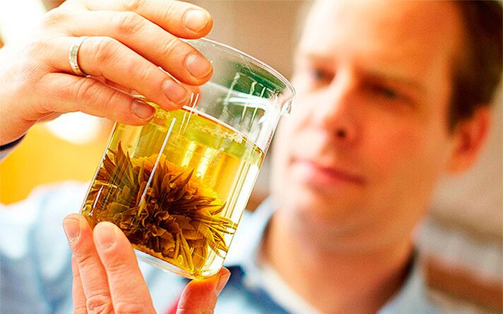 A man cooks grass to increase sexual activity